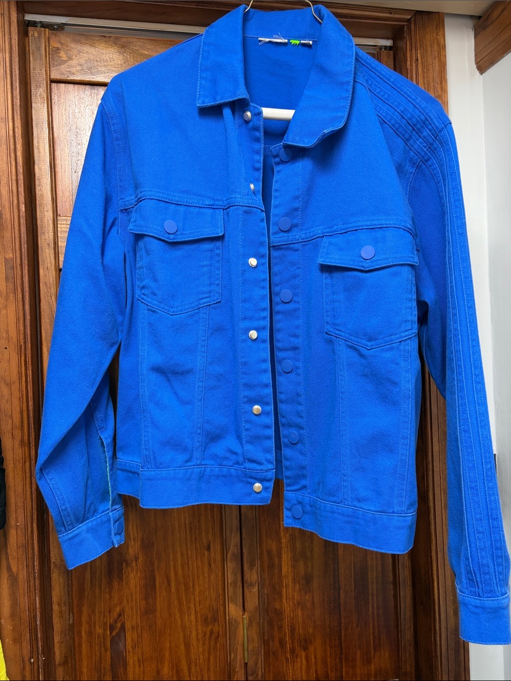 Cobalt Blue Jacket w/Adidas logo on the back n’ neon green lining on wrist